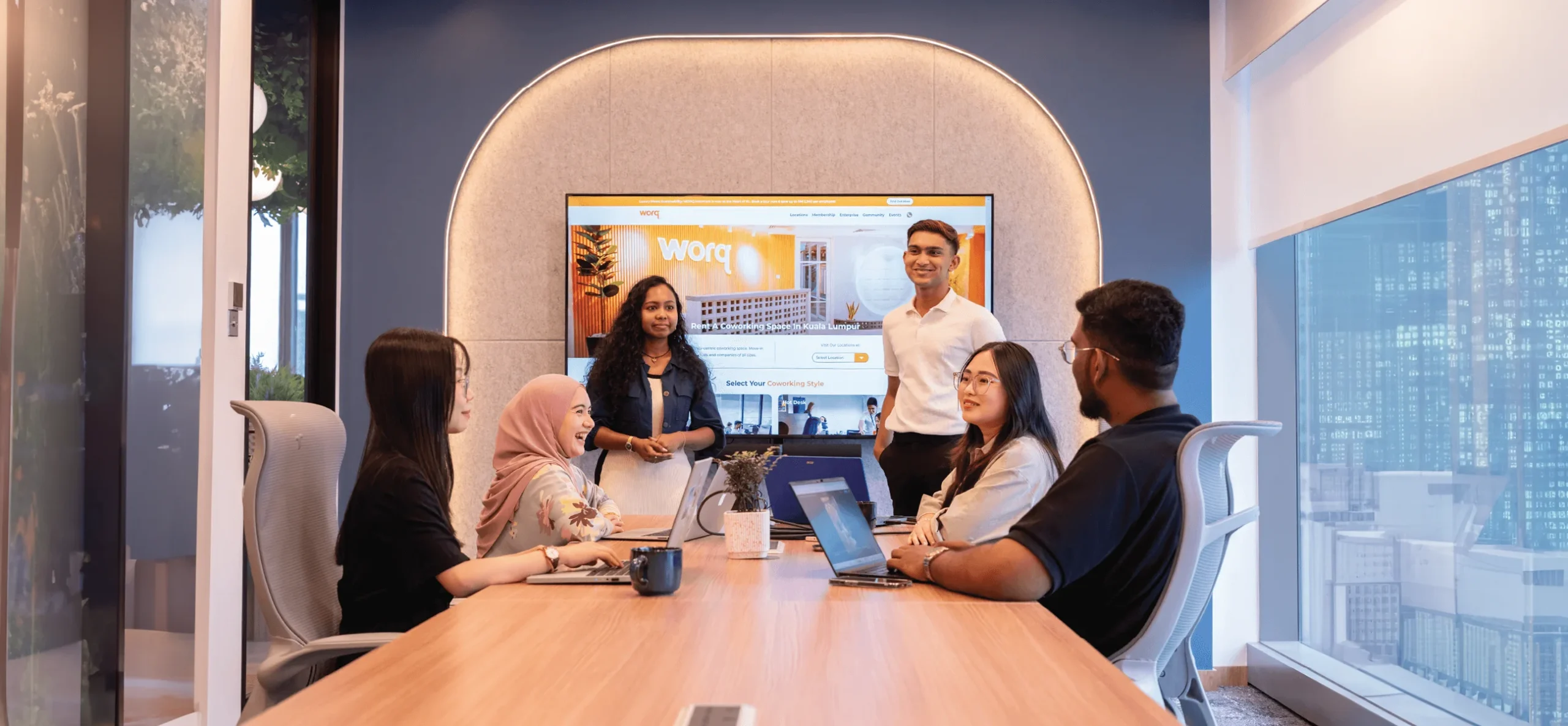 Meeting room for rent in Kuala Lumpur with city skyline view at WORQ coworking space