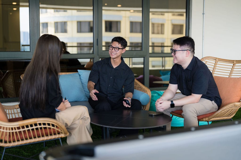 WORQ members having a discussion in a coworking lounge at Bandar Utama
