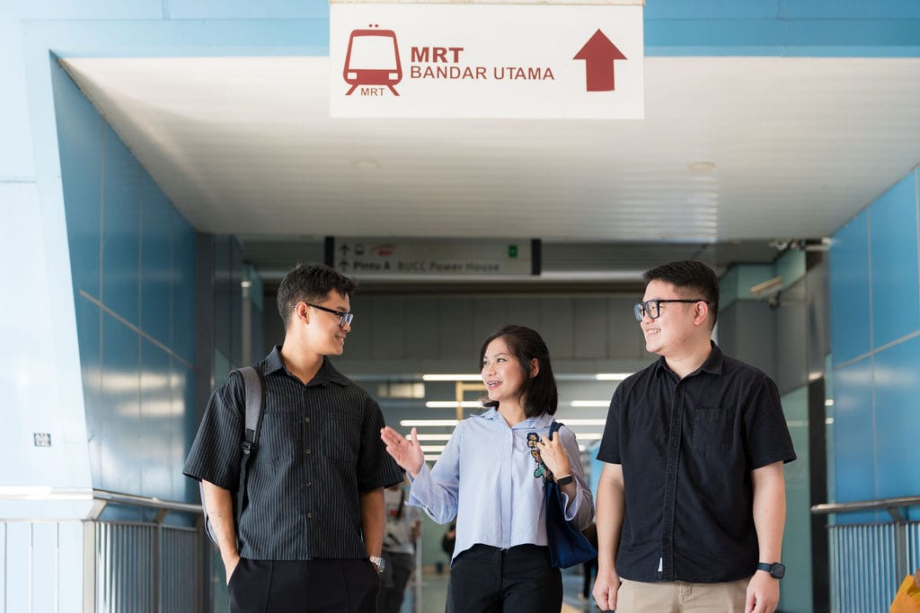 WORQ members walking near MRT Bandar Utama station